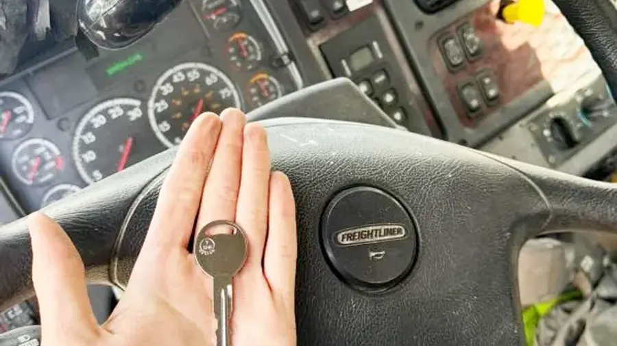Locksmith replacing a semi truck key in Austin, Texas